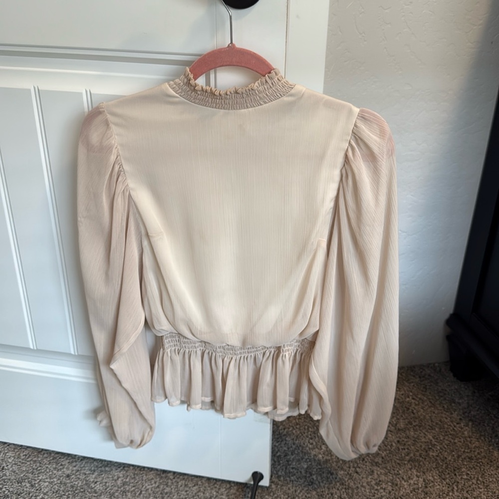 Blush colored blouse